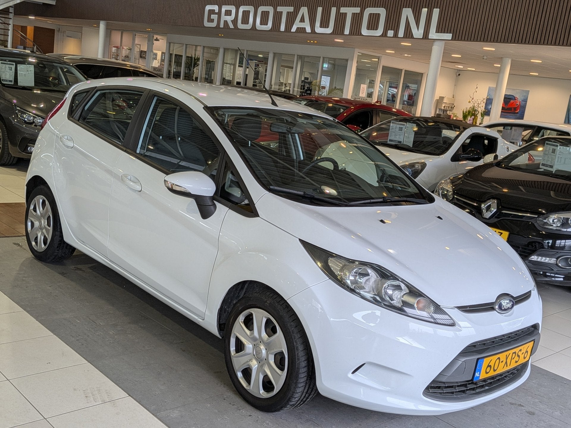 Ford Fiesta 1.25 Champion Airco, Stuurbekrachtiging, Voorwielaandrijving, Euro 5, Stof, 1242 cc