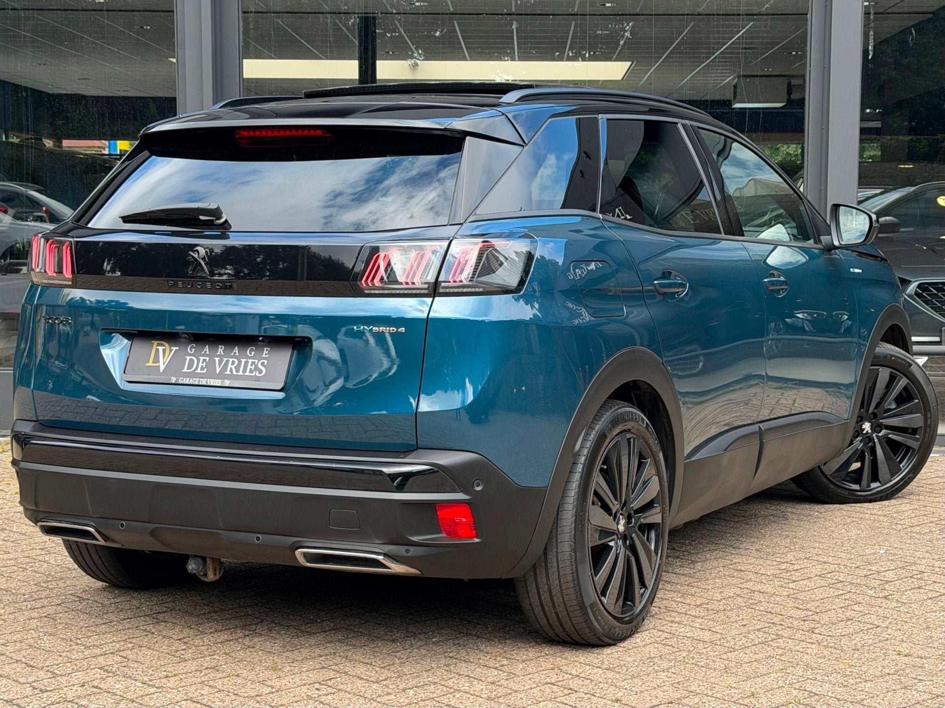 Peugeot 3008 1.6 HYbrid4 300 GT Panoramadak ACC Focal Nachtz, Auto's, Automaat, 77 km/l, Gebruikt, 4 cilinders