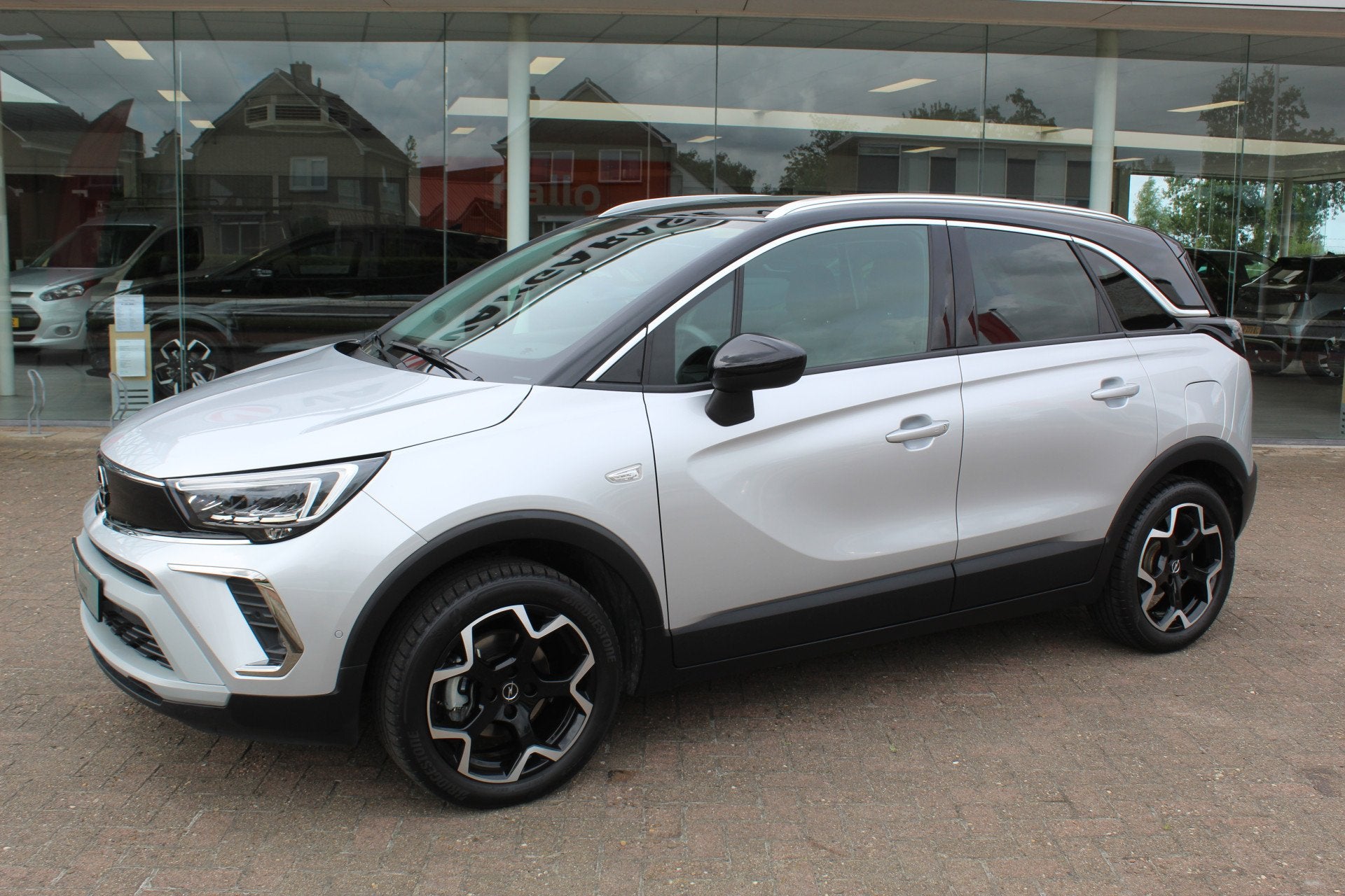Opel Crossland 1.2-110pk Turbo 'Elegance'. Mooie en luxe hoo, Auto's, Opel, 12 maanden, Gebruikt, Zwart, 1199 cc
