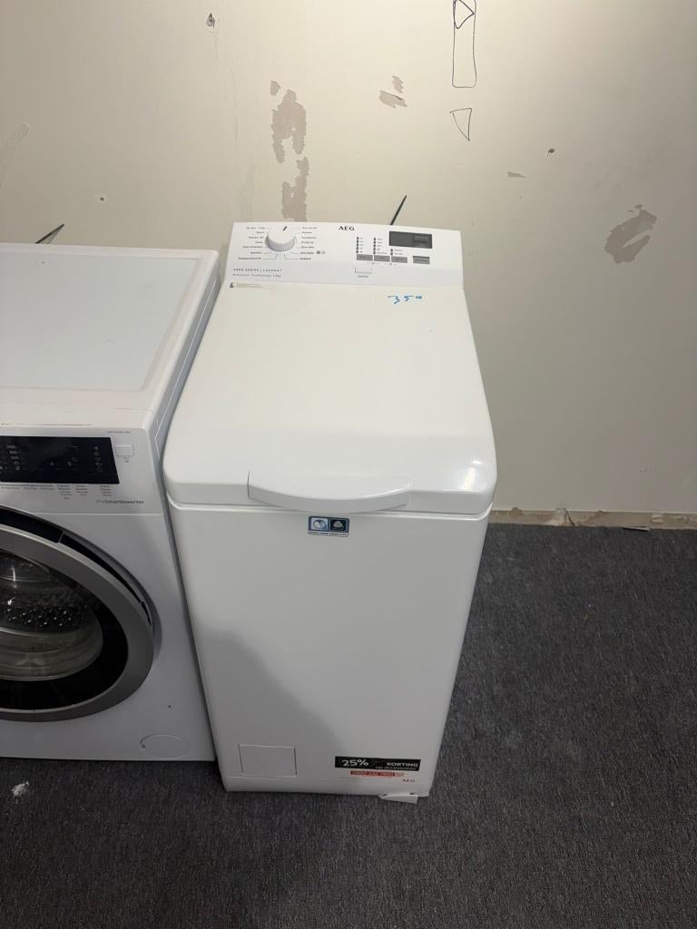 AEG bovenlader - schoon - garantie, Witgoed en Apparatuur, Wasmachines, Gebruikt, Bovenlader, 4 tot 6 kg, 85 tot 90 cm, 1200 tot 1600 toeren