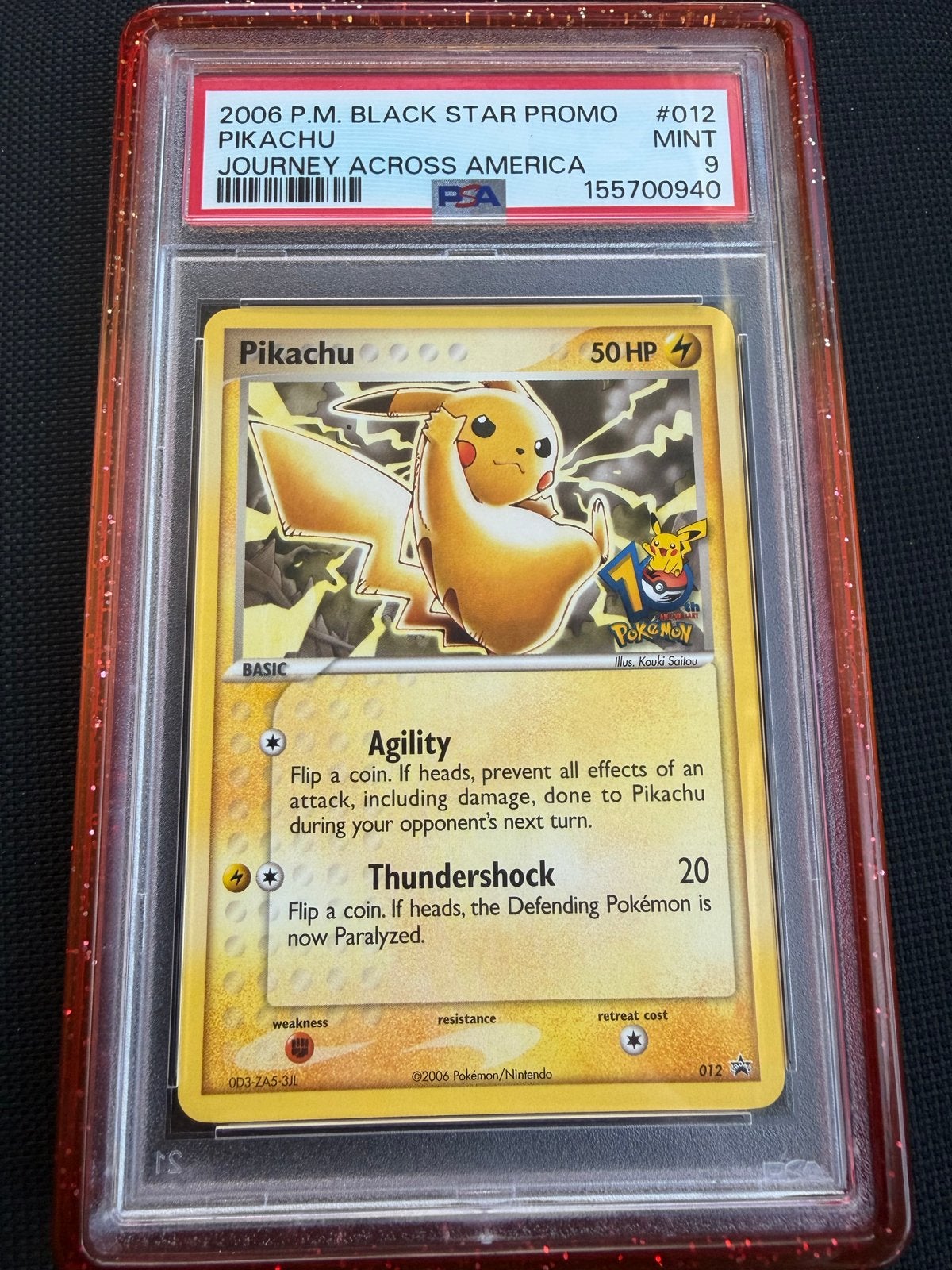 PSA 9 Pikachu Black Star Promo #012 Journey Across America, Ophalen of Verzenden, Zo goed als nieuw, Losse kaart