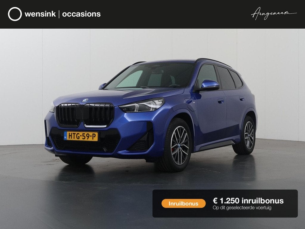 BMW X1 xDrive25e | M-Pakket | Curved Display | Sportstoelen, Auto's, BMW, Gebruikt, Euro 6, 16 kWh, Blauw