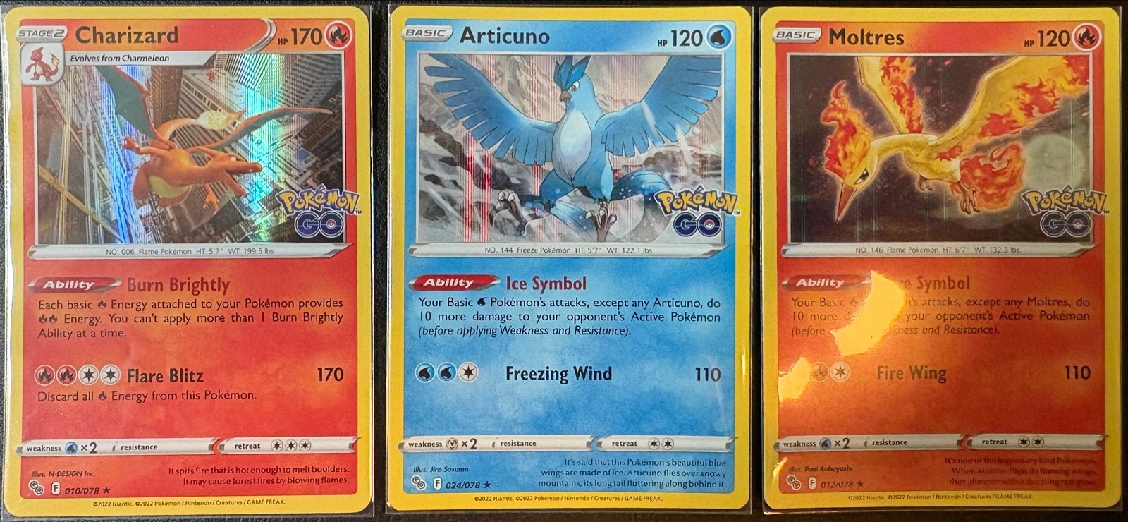 PGO Charizard, Articuno, Moltres (010, 024 & 012), Ophalen of Verzenden, Zo goed als nieuw, Meerdere kaarten
