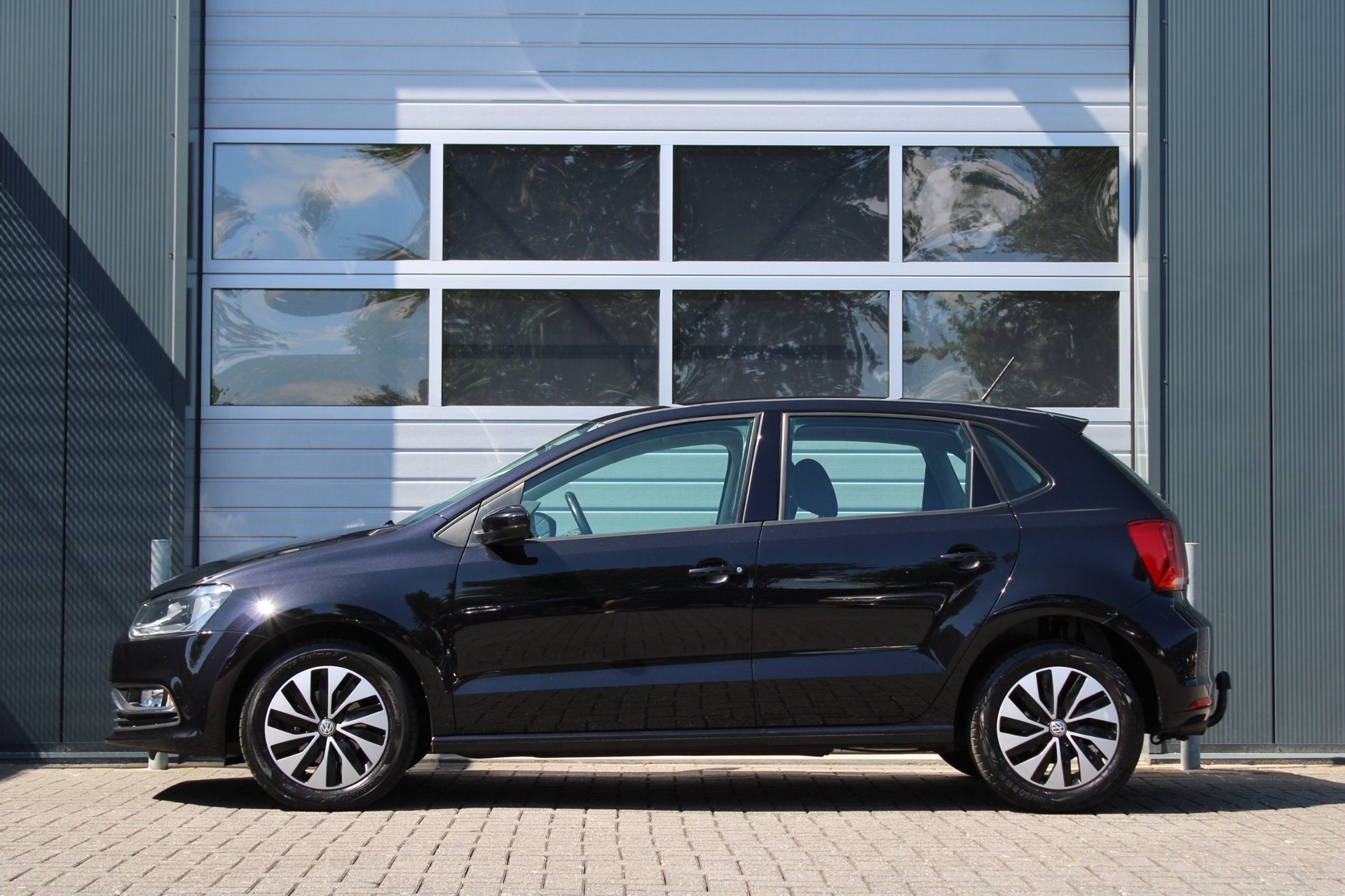 Volkswagen Polo 1.2 TSI Comfortline 5-Deurs Airco/Cruise/Ele, Stof, 4 cilinders, Start-stop-systeem, Zwart