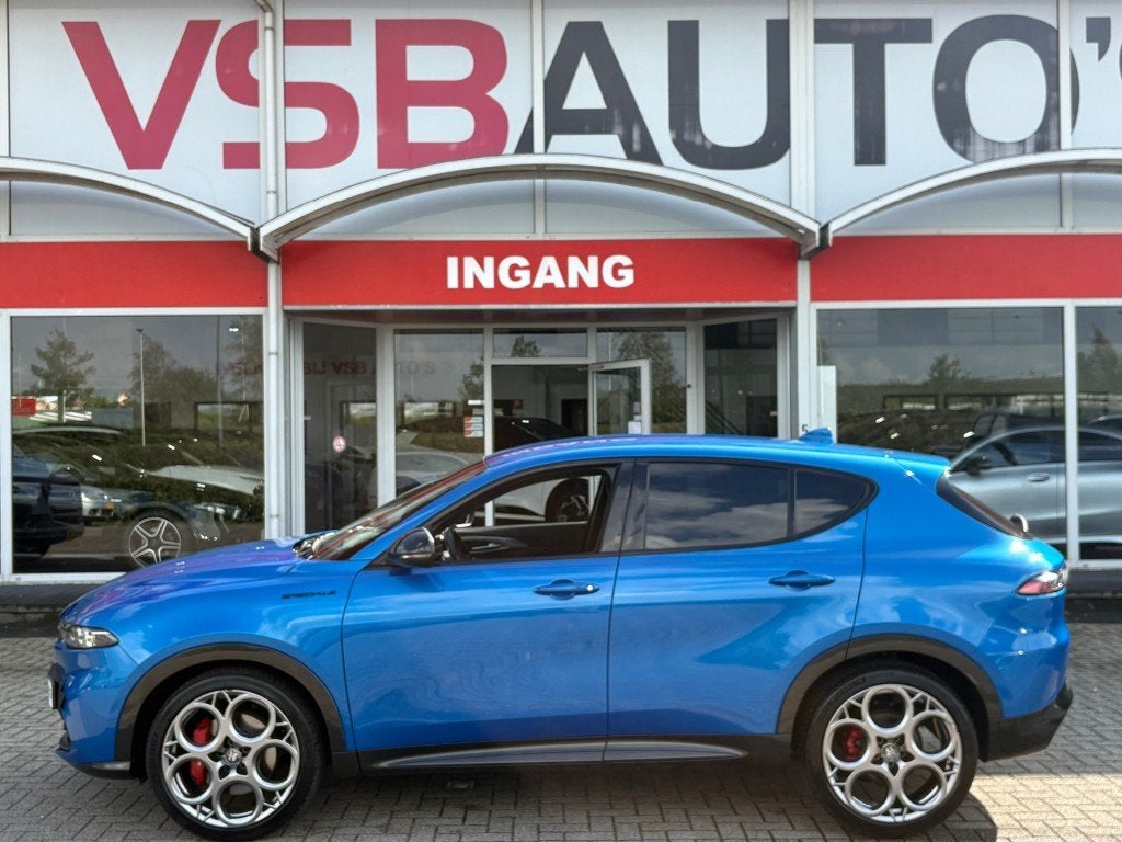 Alfa romeo TONALE 1.5T HYBRID AUT. EDIZIONE SPECIALE LED NAV, Auto's, Gebruikt, Huisgarantie, Met garantie (alle), Blauw