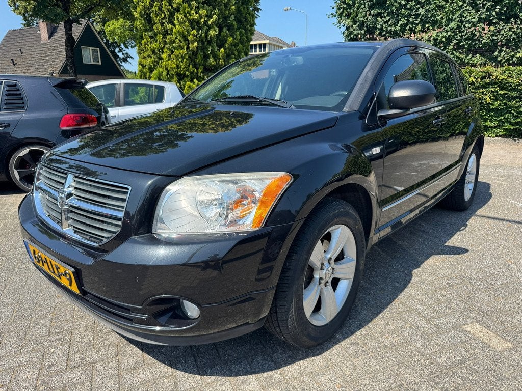 Dodge Caliber 2.0 SXT Automaat,Apk 28/6/27,Airco,Cruise,Nap, Auto's, Dodge, 450 kg, Gebruikt, Zwart, Navigatiesysteem