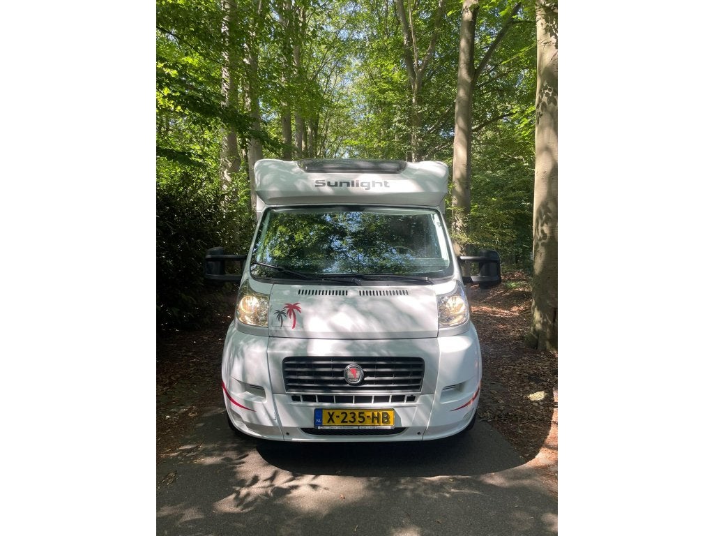 Sunlight T 68 Enkele Bedden Hefbed 2x Airco Vol Extra's 2014, Caravans en Kamperen, Campers, Sunlight, Ringverwarming, Fiat, Bedrijf