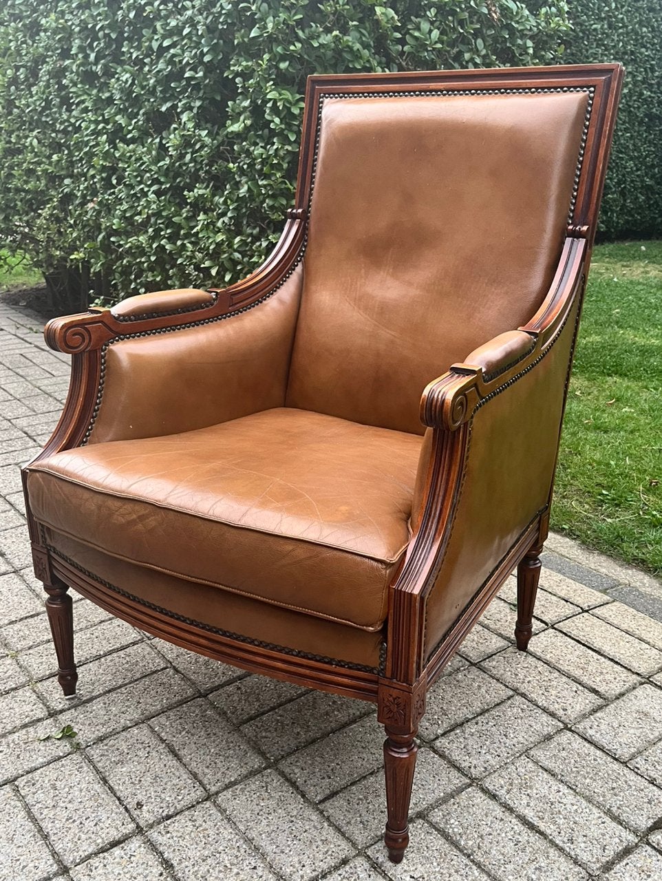 Antieke leren fauteuil, Ophalen