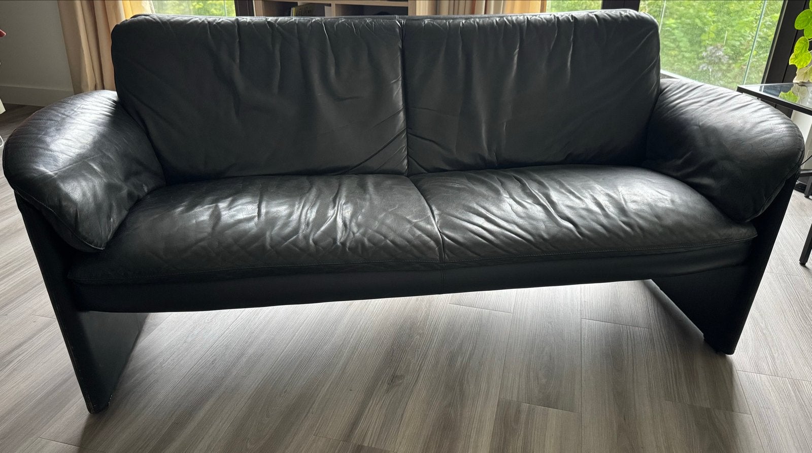 Leolux 2-zitsbank zwart leer - 180cm, Huis en Inrichting, Banken | Sofa's en Chaises Longues, Ophalen, Gebruikt, Minder dan 75 cm
