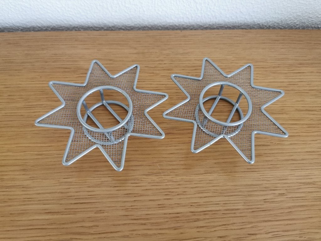 2 waxinelichtje houders in de vorm van een ster, Ophalen of Verzenden, Gebruikt, Kaars