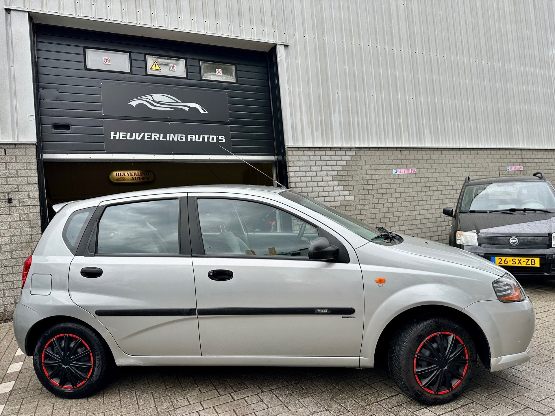 Chevrolet Kalos 1.4 Spirit | Airco | D-Riem VV | PDC, Auto's, Stof, Zwart, 4 cilinders, Metallic lak