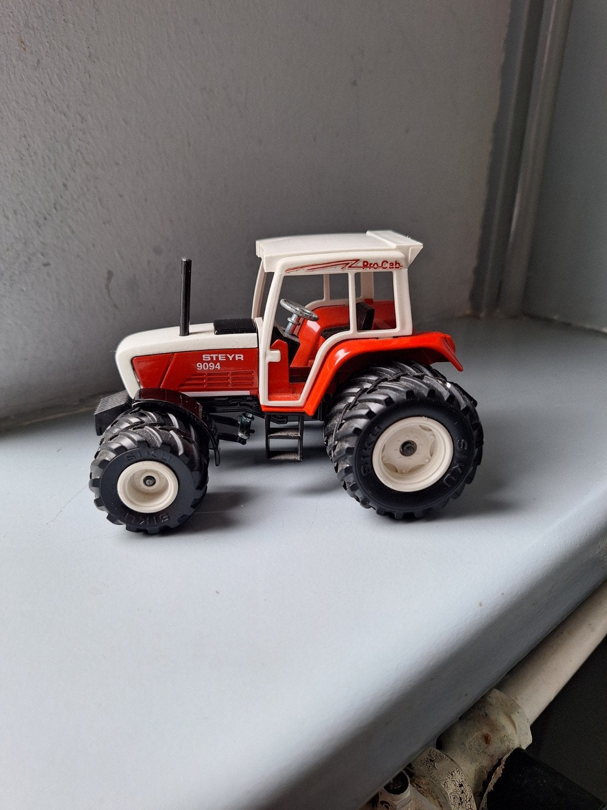 Siku Steyr 9094 Tractor Model - Speelgoed Tractor, Hobby en Vrije tijd, Ophalen of Verzenden, Gebruikt