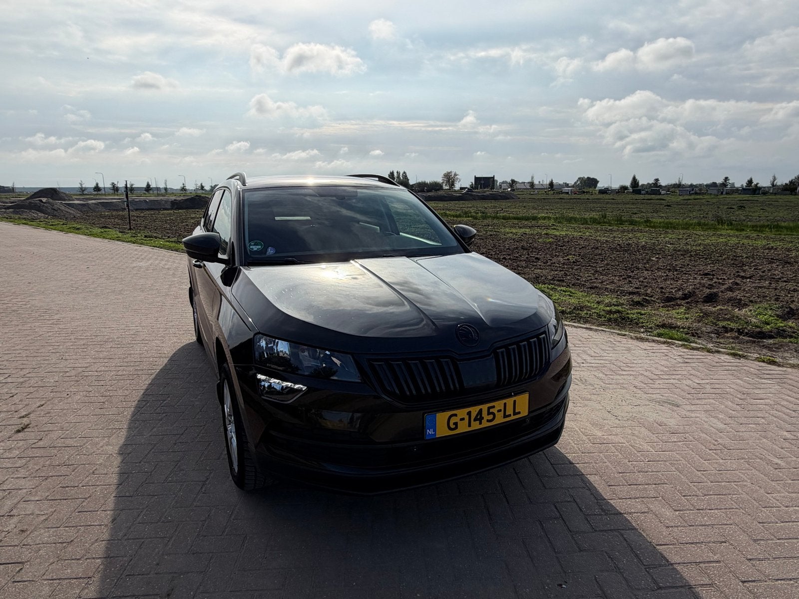 Skoda Karoq 1.5 TSI ACT Greentech 150pk Dsg-7 2018 Bruin, Auto's, Stof, 1498 cc, 4 cilinders, Bruin