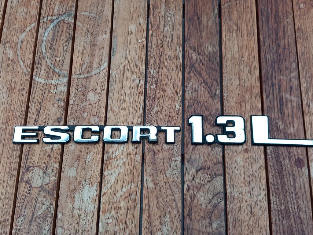 Ford Escort embleem origineel 1981, Ophalen of Verzenden, Gebruikt