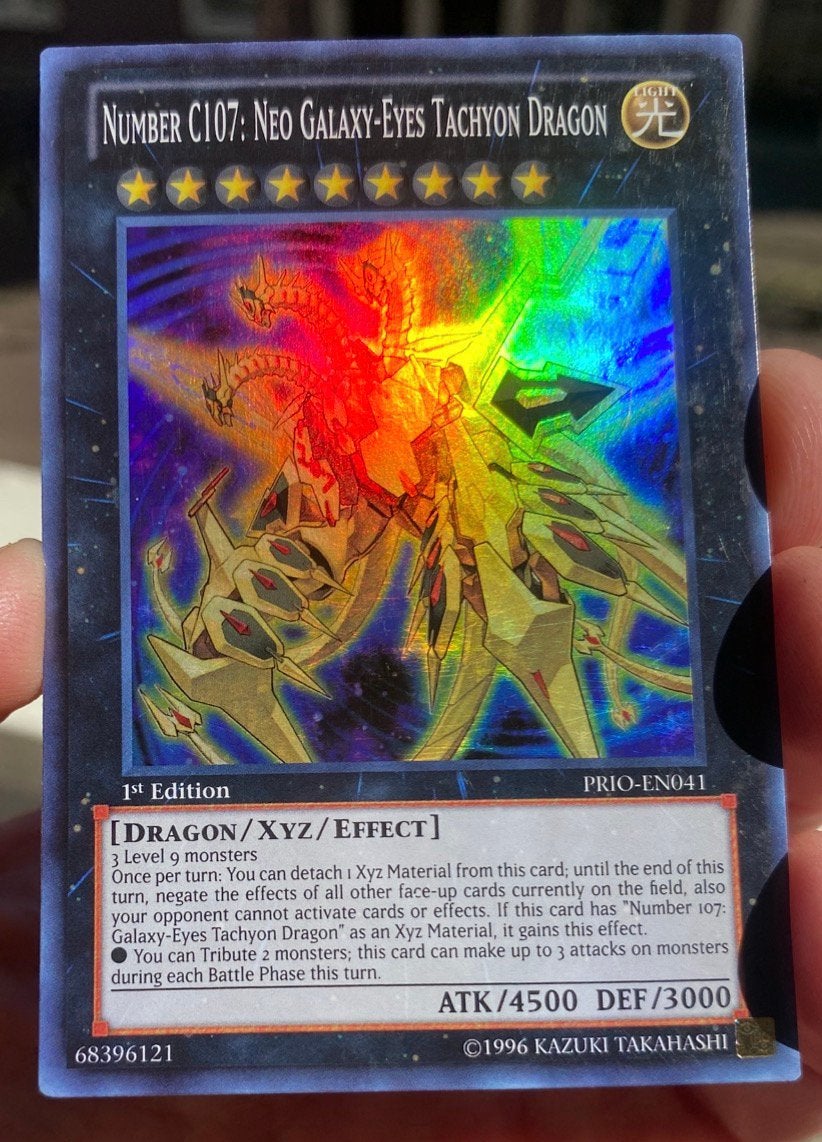 Yu-Gi-Oh! Number C107: Neo Galaxy-Eyes Tachyon Dragon PRIO !, Ophalen of Verzenden, Zo goed als nieuw, Losse kaart, Foil