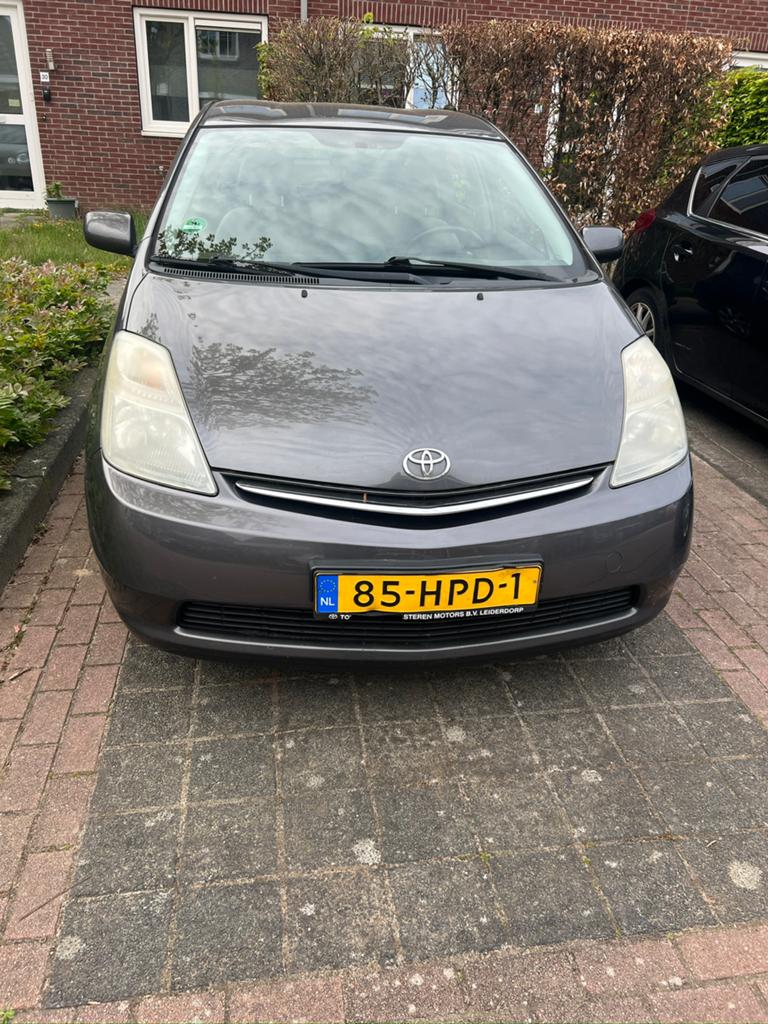 Toyota Prius 1.5 HSD 2009 Grijs, Auto's, 1497 cc, 4 cilinders, 23 km/l, Origineel Nederlands