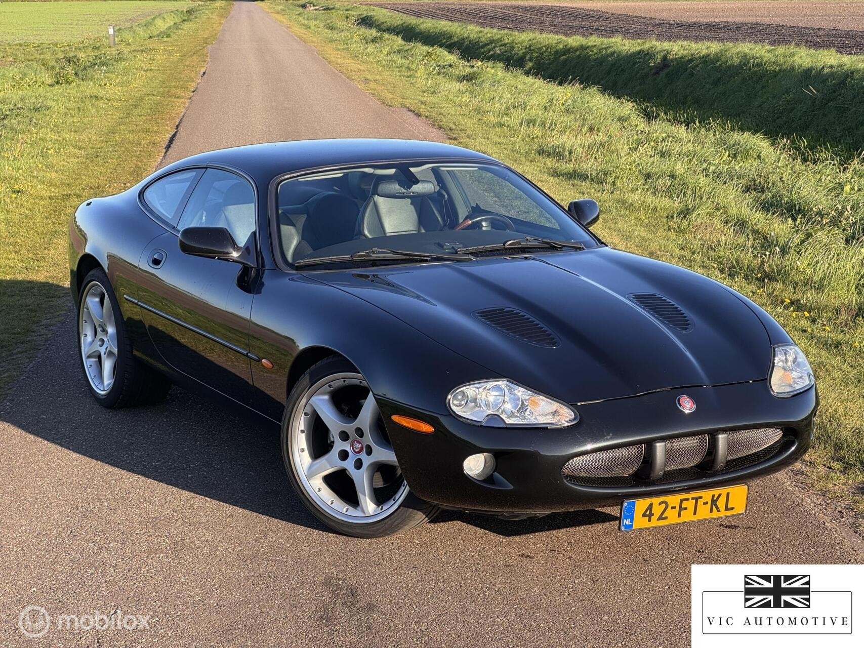 Jaguar XKR 4.0 V8 Coupé - Recaro - gereviseerde motor, Auto's, Jaguar, Achterwielaandrijving, Gebruikt, 4 stoelen, Zwart