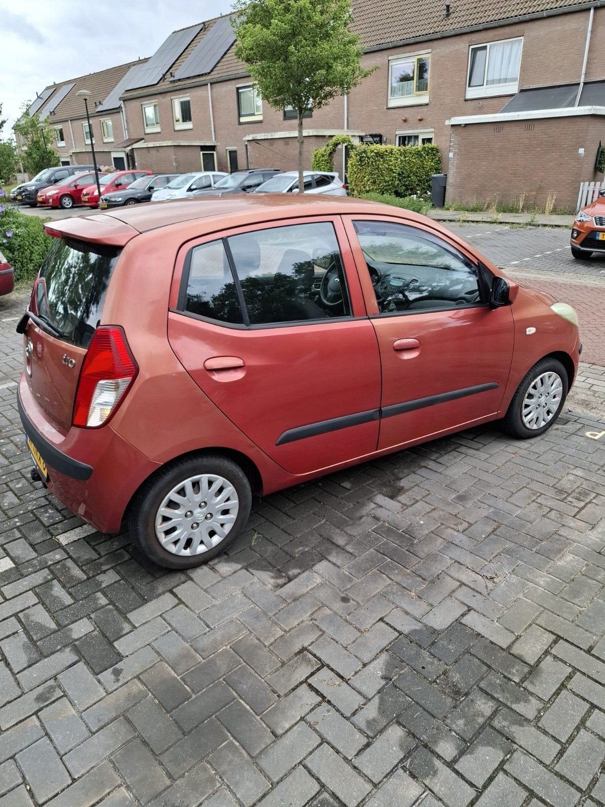 Hyundai i10 1.1 I 5DR 2009 Rood, Auto's, Voorwielaandrijving, Stof, 4 cilinders, 400 kg