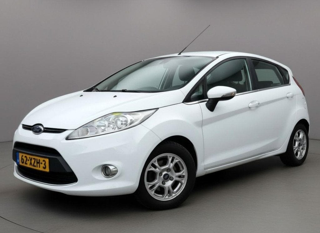 Ford Fiesta 1.6 TDCi ECOnetic Lease Titanium Airco Cruise 12, Auto's, Voorwielaandrijving, Stof, Gebruikt, Zwart