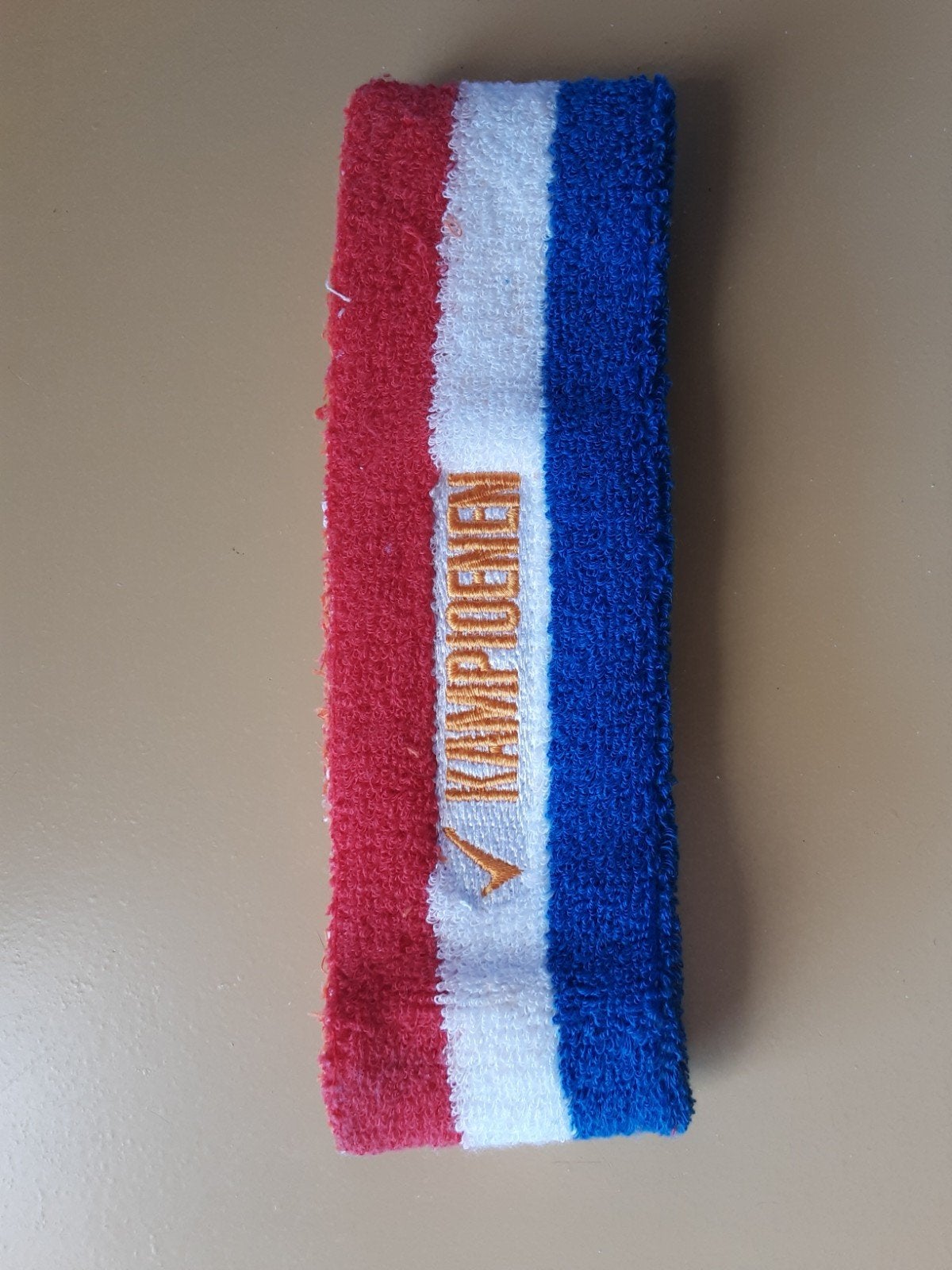 2 zijdig zweetbandje, oranje, rood wit blauw. kampioenen., Sport en Fitness, Ophalen of Verzenden, Zo goed als nieuw