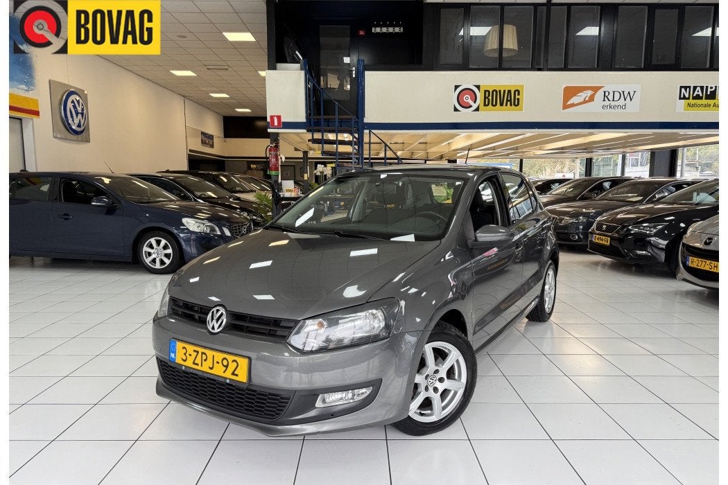 Volkswagen Polo 1.2 TSI Highl Bovag Garantie Automaat, Auto's, Automaat, Stof, 4 cilinders, Bedrijf