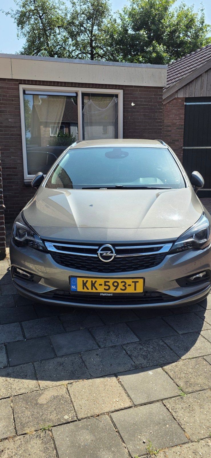 Opel Astra 1.0 Turbo 77KW Sports Tourer 2016 Bruin, Auto's, Voorwielaandrijving, 1178 kg, Bruin, 620 kg