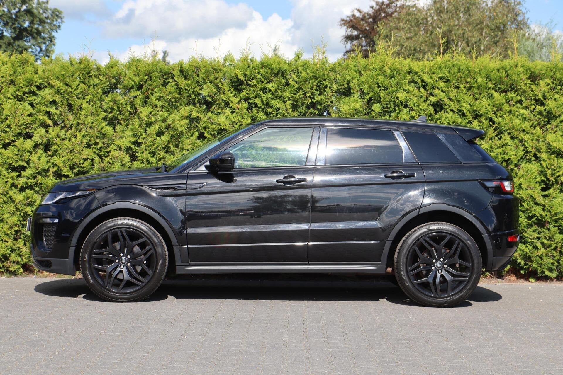 Range Rover Evoque 2.0 Si4 241PK HSE Automaat | MERIDIAN | M, Auto's, Automaat, 4 cilinders, Zwart, Bedrijf