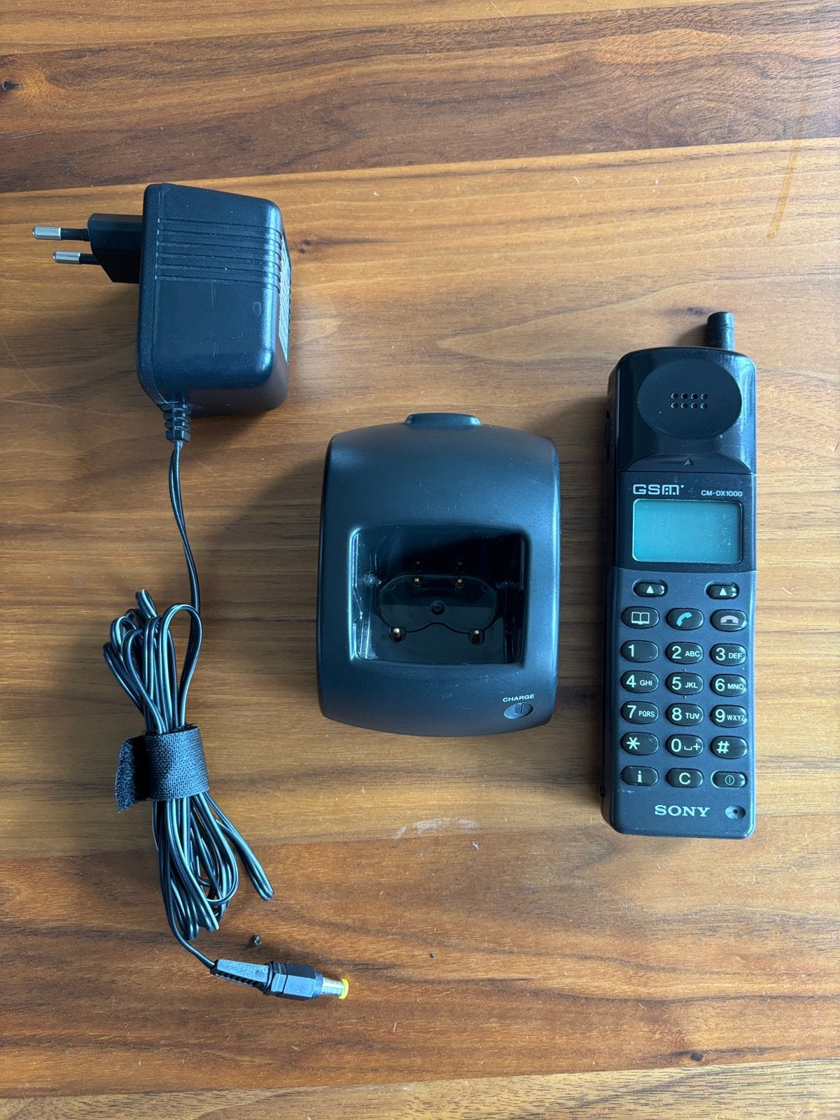 Sony CM-DX1000 GSM 1997 met cradle + lader — defect, Ophalen of Verzenden, Niet werkend, 1 handset