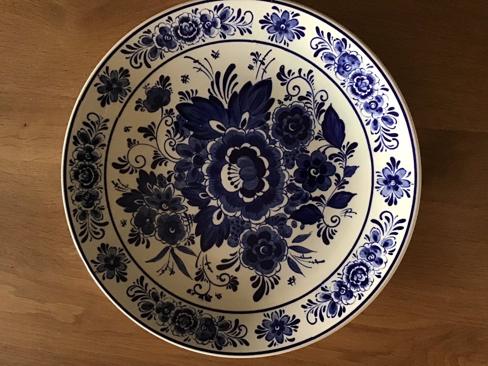 Delfts blauw wandbord (doorsnede 33 cm), Ophalen