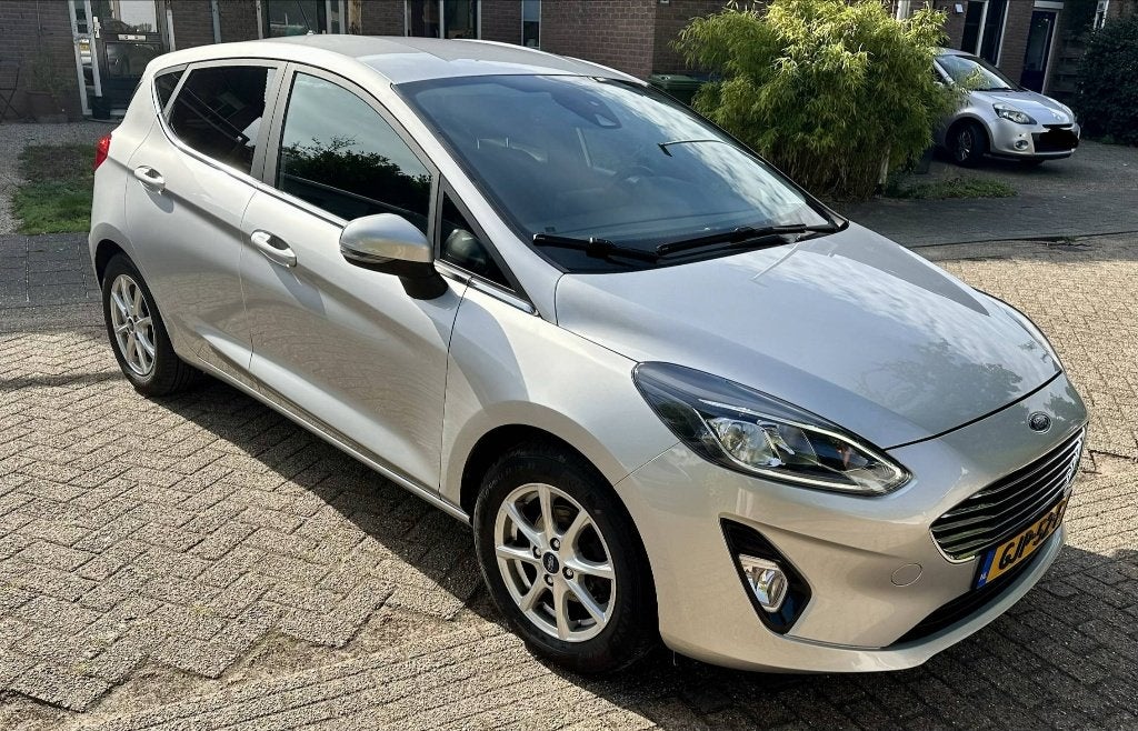 Ford Fiesta 1.0 EcoBoost 100pk Titanium 2021 - Nieuwe banden, Voorwielaandrijving, Leder en Stof, Lichtsensor, Handgeschakeld
