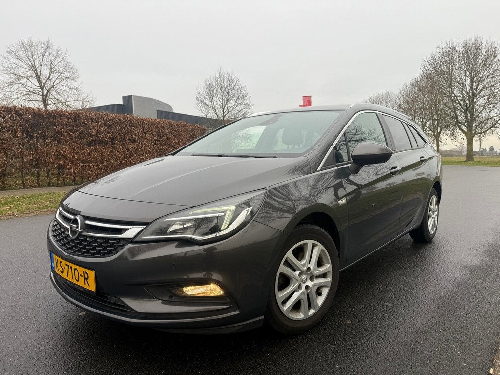 Opel Astra Sports Tourer 1.0 Business+ NAVI/CLIMA/APK/CRUISE, Auto's, Voorwielaandrijving, Gebruikt, Euro 6, 1178 kg