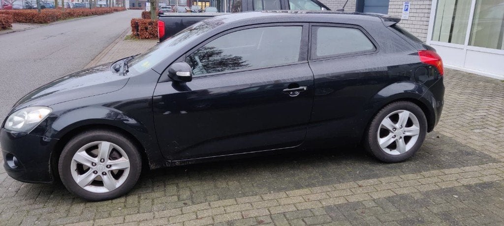 Kia (Pro) Cee d 1.6 2010 Zwart, Auto's, Voorwielaandrijving, 1591 cc, 4 cilinders, Airbags