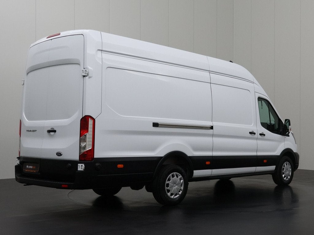Ford Transit 2.0TDCi 130PK L4H3 Jumbo | Airco | Cruise | 3-Z, Auto's, Bestelauto's, Mistlampen, Stof, Gebruikt, Wit