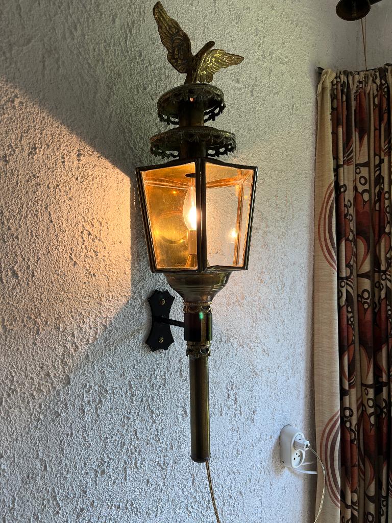 Antieke koetslamp, Ophalen