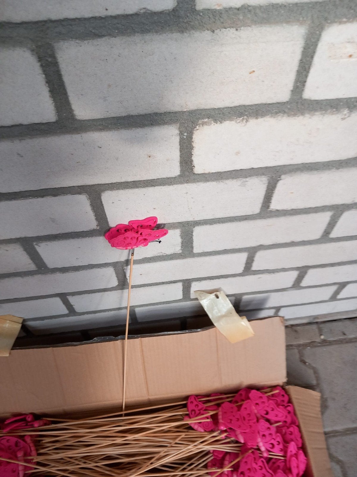 decoratie vlinder roze, Ophalen