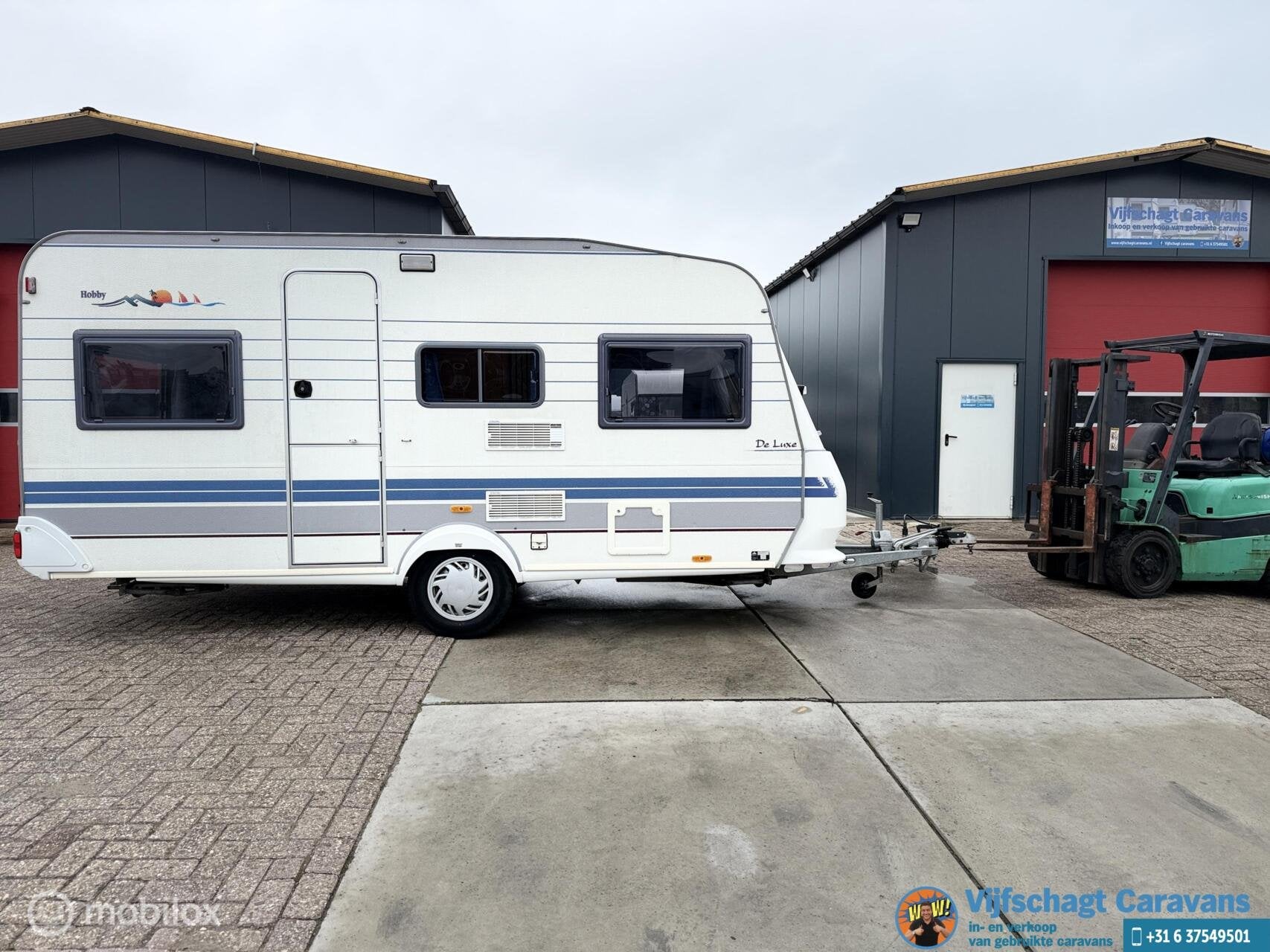 Hobby De Luxe 450 incl voortent en luifel, Hobby, Bedrijf, Schokbreker, 6 tot 7 meter