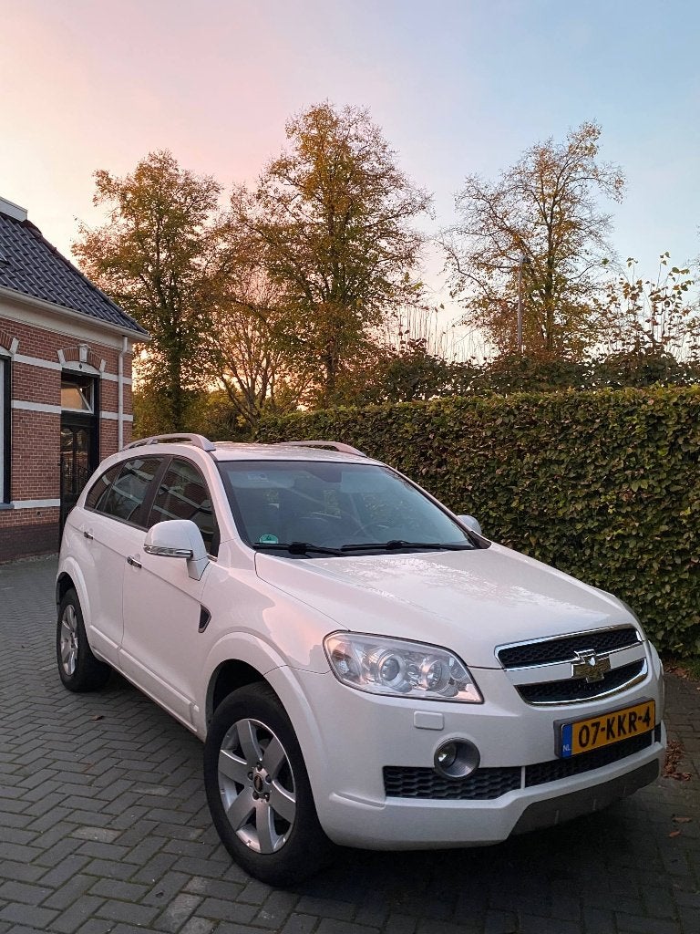 Chevrolet Captiva 2.4 4WD 2009 Parelmoer wit, Auto's, 136 pk, 7 stoelen, Wit, Handgeschakeld