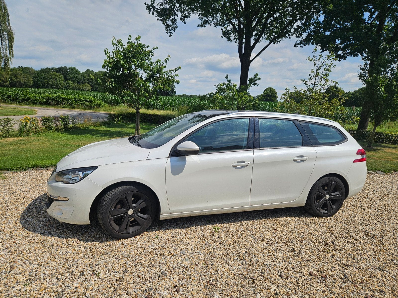 Mooie sportieve Peugeot 308 wit panorama dak! 1.2 km125875, Auto's, 1199 cc, 1165 kg, Stationwagon, Particulier