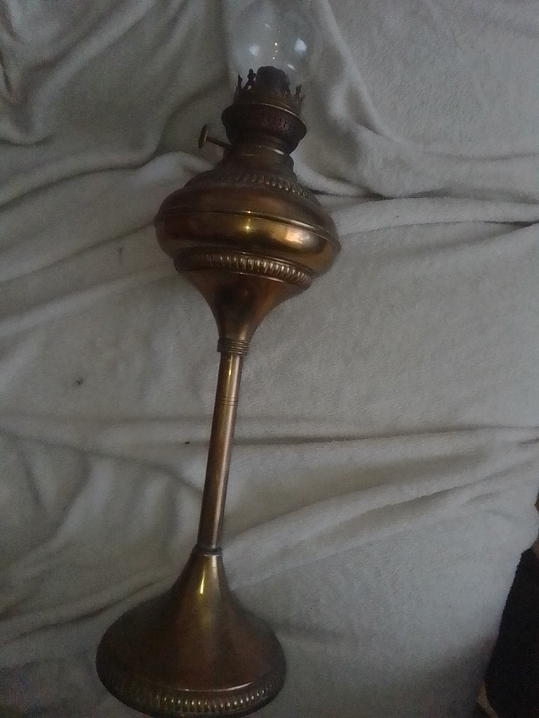 Oude koperen olielamp, Ophalen