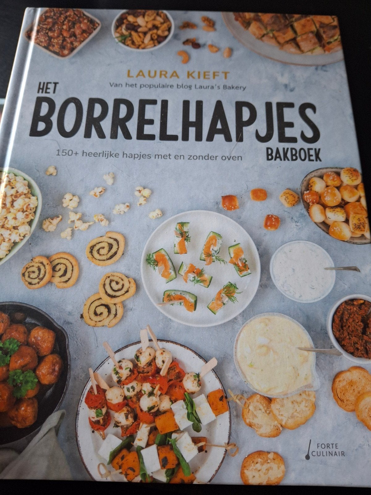 Het Borrelhapjes Bakboek - Laura Kieft, Tapas, Hapjes en Dim Sum, Ophalen of Verzenden, Zo goed als nieuw, Laura Kieft