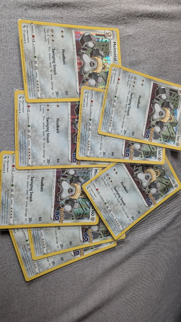 Pokemon lot Melmetal SWSH Pokemon GO 046/078 Holo Rare, Ophalen of Verzenden, Zo goed als nieuw, Foil