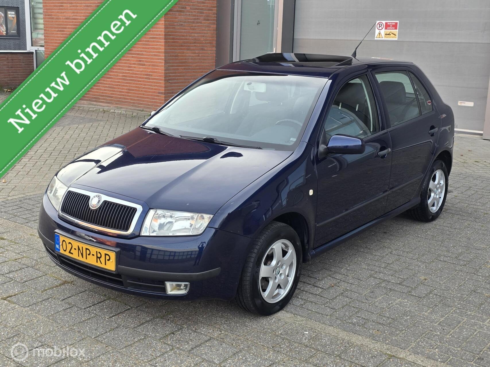 Skoda Fabia 1.4-16V Elegance_Apk_Airco, Auto's, Voorwielaandrijving, 4 cilinders, Blauw, Origineel Nederlands