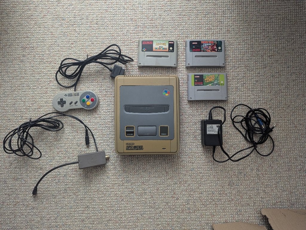 Super Nintendo (SNES) met spellen en accessoires, Spelcomputers en Games, Ophalen of Verzenden, Gebruikt, Met 1 controller, Met games