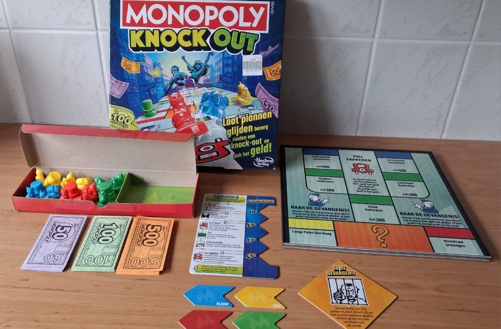 Hasbro Gaming Monopoly Knock out! Bordspel Als nieuw!, Ophalen of Verzenden, Zo goed als nieuw, Hasbro