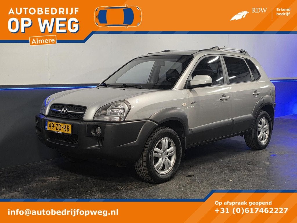 Hyundai Tucson 2.7i V6 4WD Style | Automaat | Leder | Trekha, Auto's, Automaat, Gebruikt, 2656 cc, Bedrijf