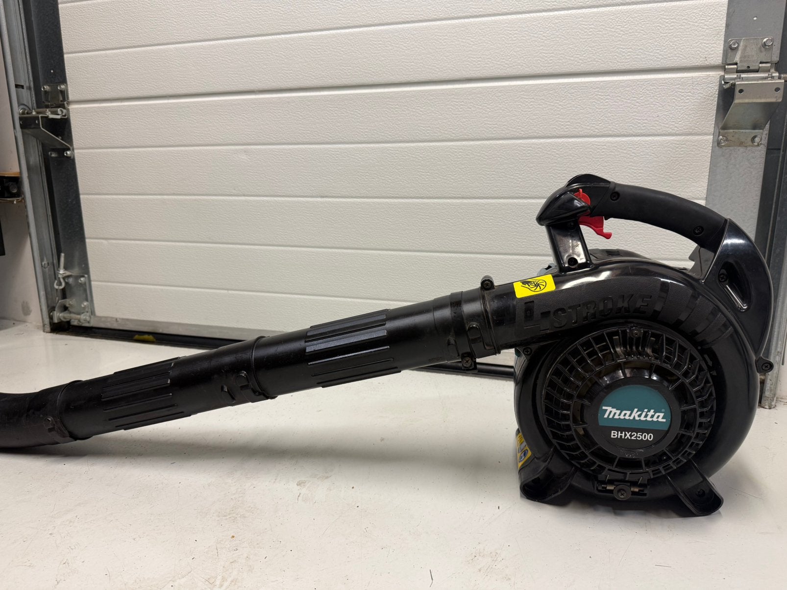 Te koop  Husqvarna handgedragen bladblazer BHX 2500, Ophalen of Verzenden, Zo goed als nieuw, Benzine