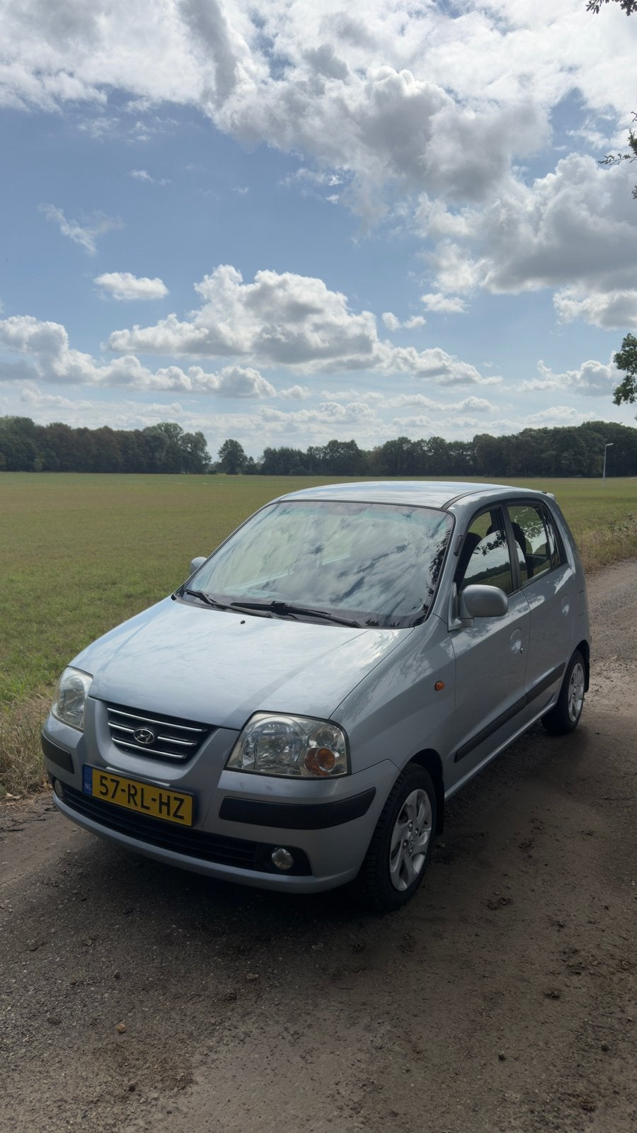 Hyundai Atos 1.1 2005 Grijs, Auto's, Voorwielaandrijving, 31 €/maand, 4 cilinders, Origineel Nederlands