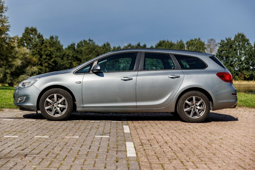 Opel Astra Sports Tourer, Auto's, Voorwielaandrijving, Stof, Zwart, 4 cilinders