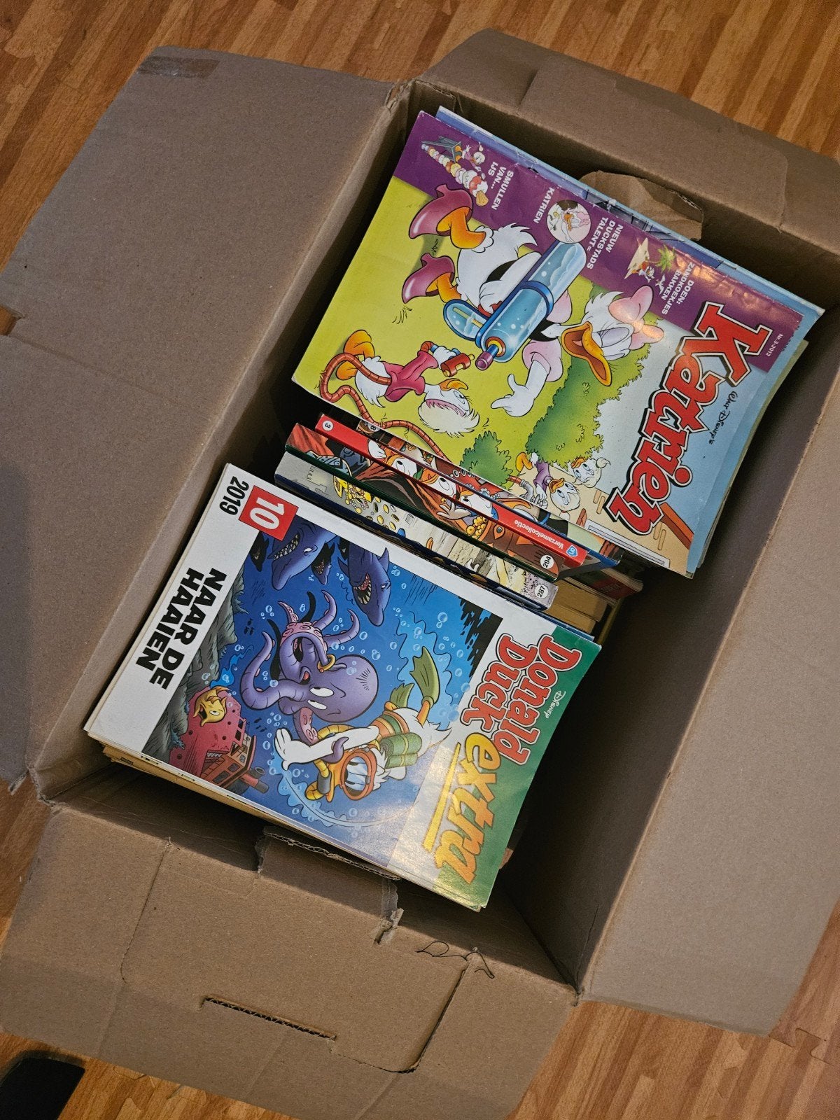 Een verhuisdoos vol Duckies! Weken leesplezier!, Meerdere stripboeken, Ophalen, Gelezen
