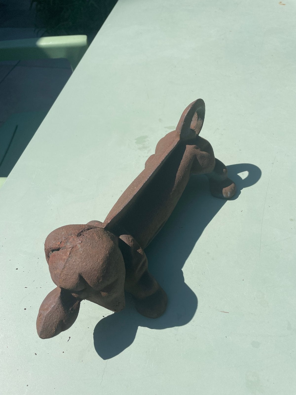 Zware teckel deurstopper - decoratief en functioneel, Binnen, Gebruikt, Ophalen of Verzenden, Bruin